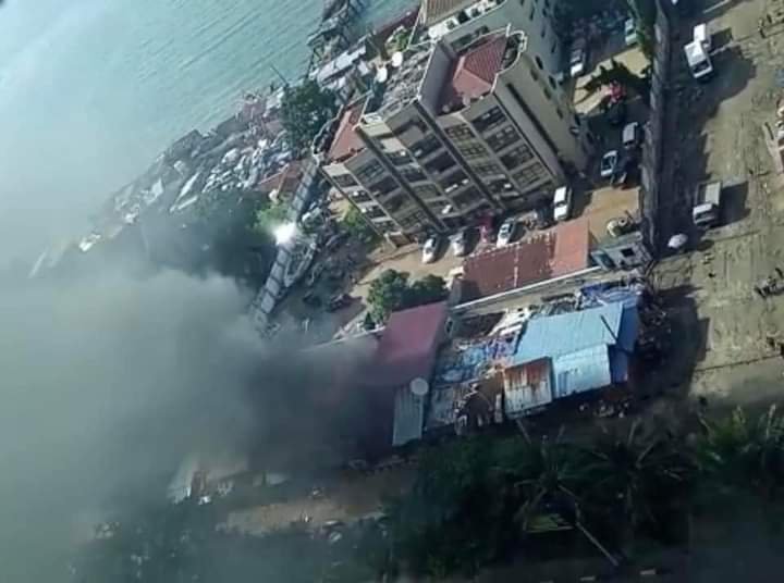 ONE CONFIRMED DEAD FROM FIRE DISASTER AT GOVERNMENT WHARF