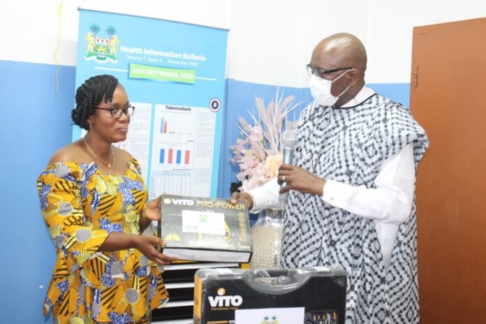 A symbolic handing over by the UNICEF Representative and the Acting Minister of Health Madam Princess Dugba