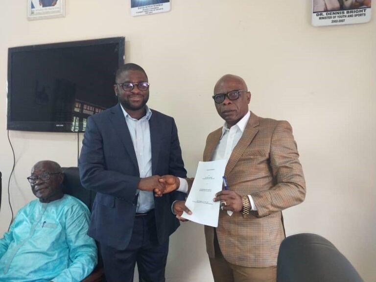 Former NSA Boss presents Handing Over Note to Dr. Emmanuel Saffa Abdulai Esq